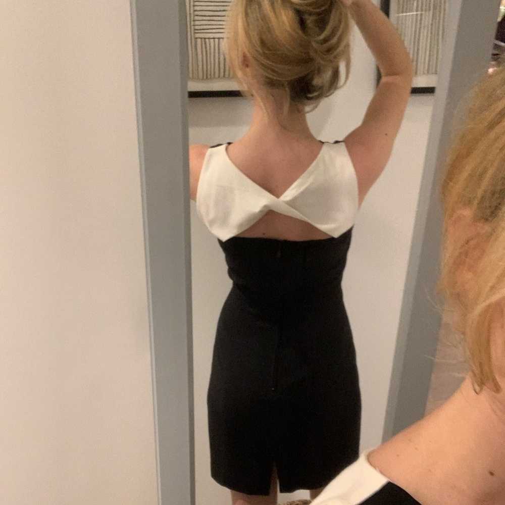 H&M little black dress with a white back twist